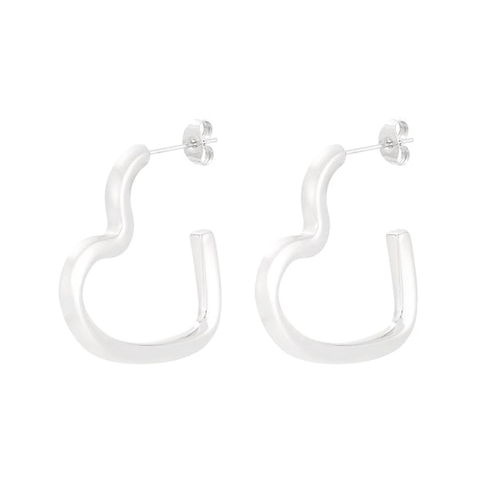 Gouden en zilveren open hart oorbellen