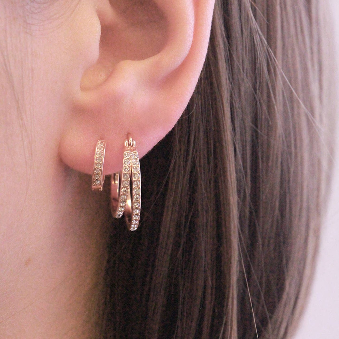 Circlet Duo oorbellen - roségoud en kristal